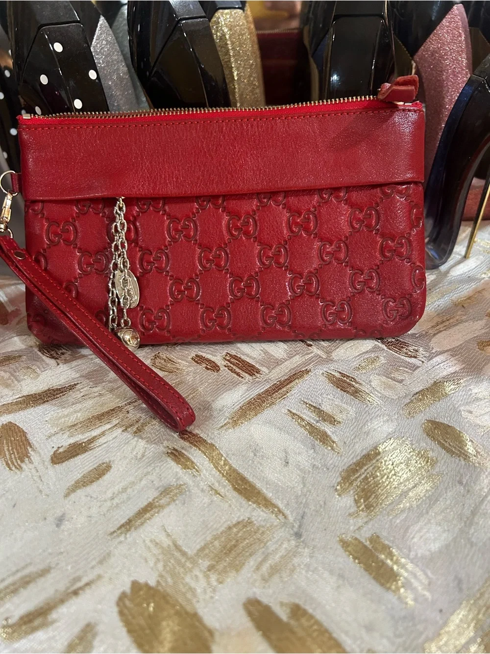 Vintage GG Red Embossed GG Leather Wristlet with Silver Chain Charm